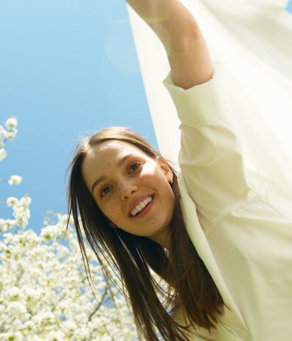 Woman feeling energized and happy during a light workout.